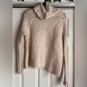 Cream Bass turtle neck sweater